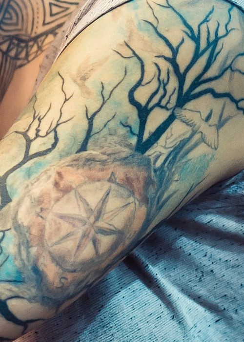 compass and trees tattoo